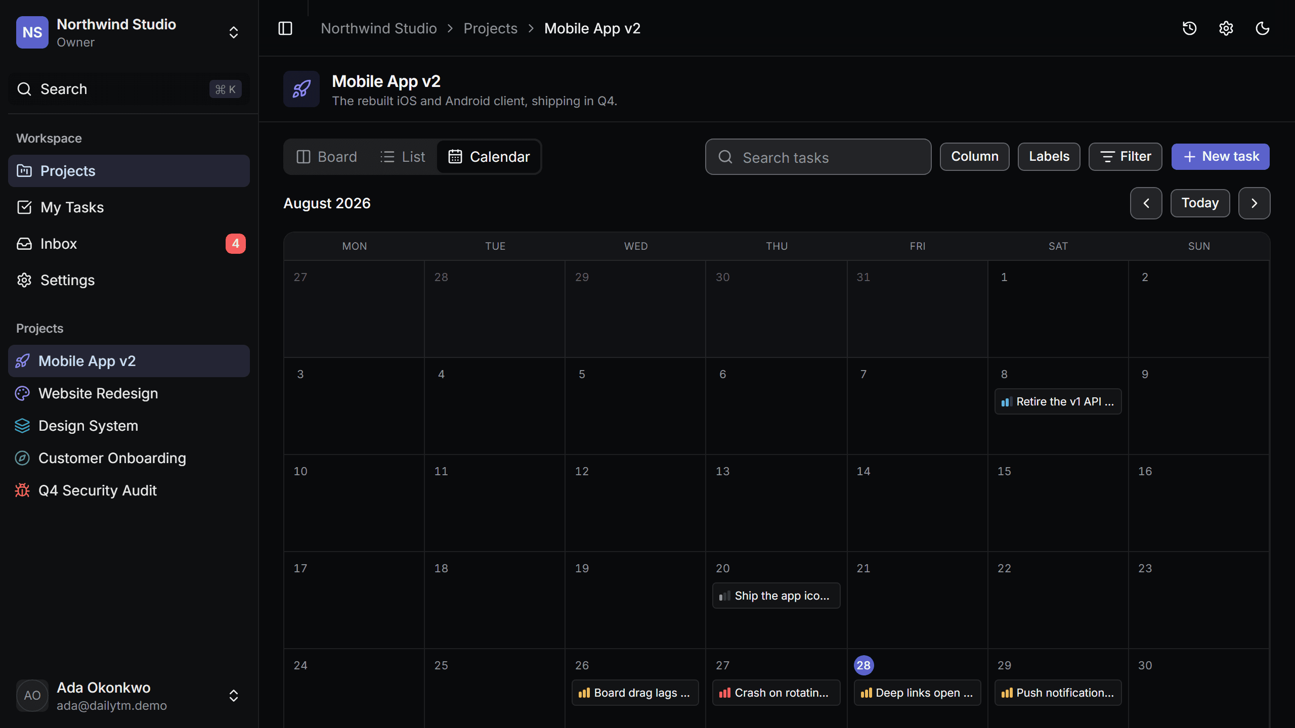 The DailyTM calendar placing tasks on their due dates across the month.